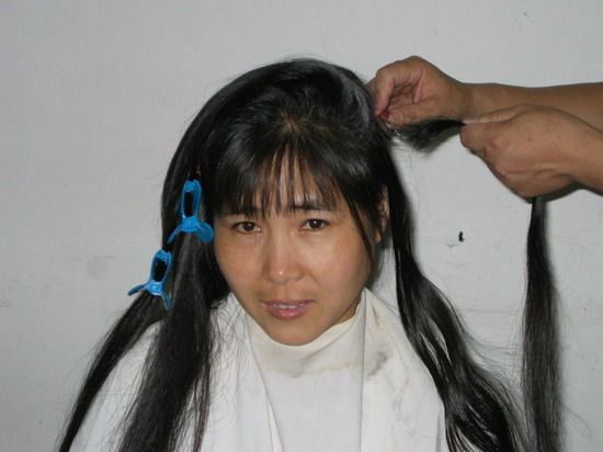 qiaoyu cut long hair