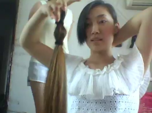 suyangyang cut another 50cm long hair