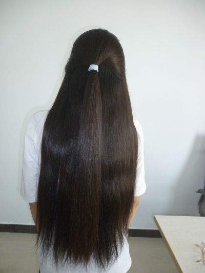 Cut waist length long hair