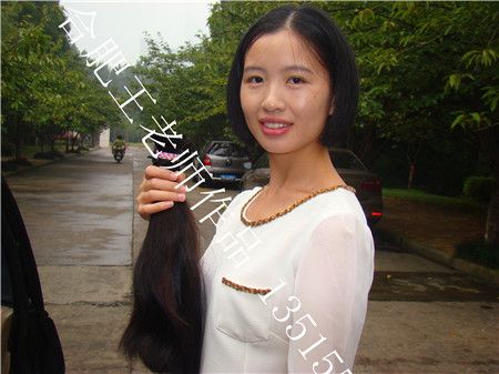 wangjiaxi cut long hair of beautiful young girl